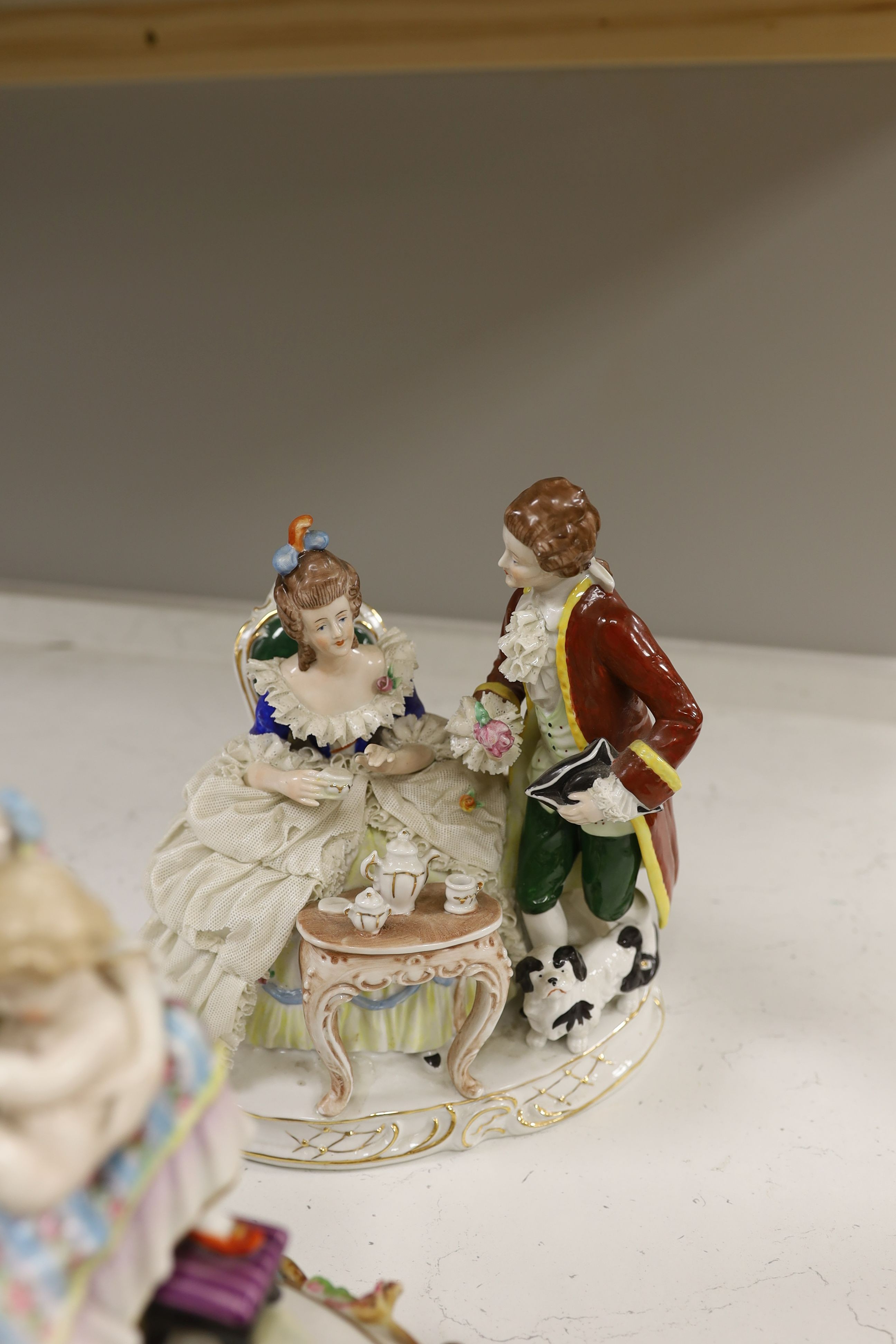 A John Bevington figural bowl, and four Continental porcelain groups and a Staffordshire style group, tallest 27cm